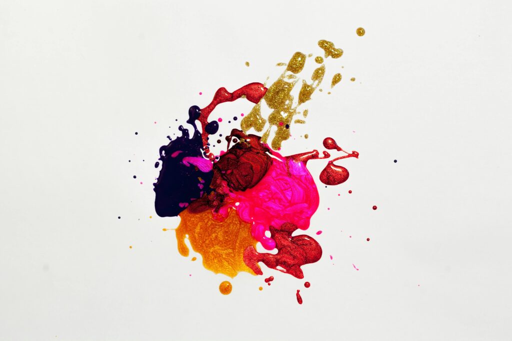 Colorful abstract paint splash on white background, capturing creative expression.